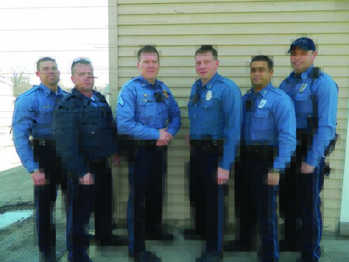 Call it in. Officers who responded to the Suspicious party call on Thursday, March 6, that resulted in a habitual criminal being sent to jail were, from left: P.O. Bronner, P.O. Walker, Sgt. Ward, P.O. Galloway, P.O. Quiles and P.O. Hansen. All work in East Patrol’s  310 Sector, Watch II.  Michael Bushnell