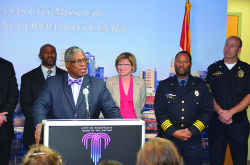 Mayor Sly James, speaking at the podium, was joined by Jackson County prosecutor  Jean Peters Baker and police chief Darryl Forté, at Friday's press conference. 