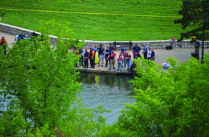 Rescue teams search the water for a man who was reportedly swimming and never resurfaced.