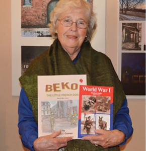 Author. Nancy Cramer poses with her two books, Beko and World War I: Student Guide. Joe Jarosz