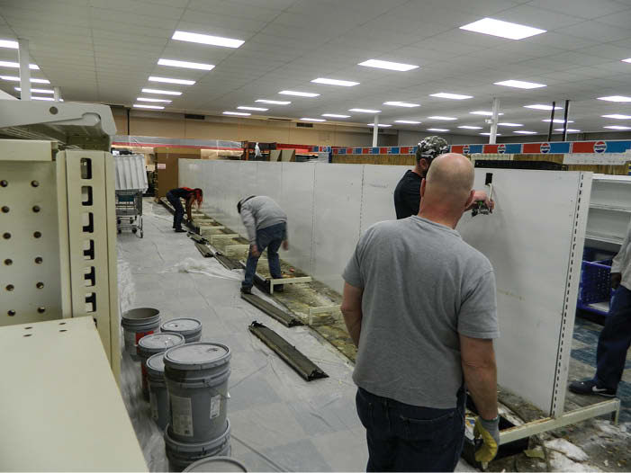 Opening soon. Work continues inside Snyder's grocery store as they hope to re-open to the Northeast community by mid-April. Michael Bushnell and Dorri Partain