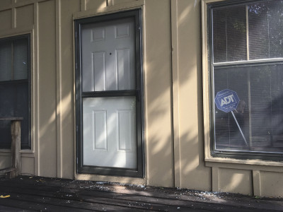 The back door of the Northeast News, which was hit by a stray bullet on the night of Wednesday, August 24. 