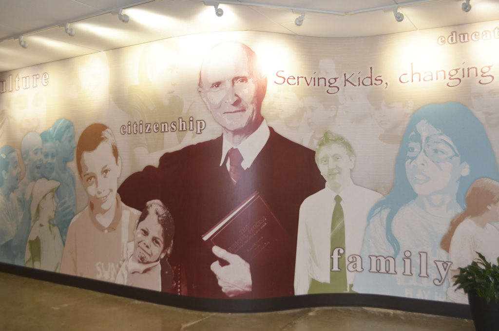 A mural of Judge Charles Shangler is prominently featured in the cafeteria of Scuola Vita Nuova.