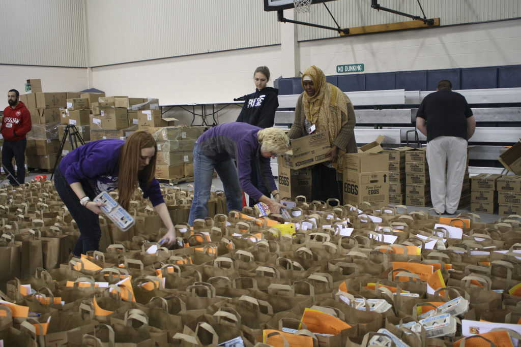 Every year at Thanksgiving, Della Lamb fills its gym with Thanksgiving fixings for low-income families.