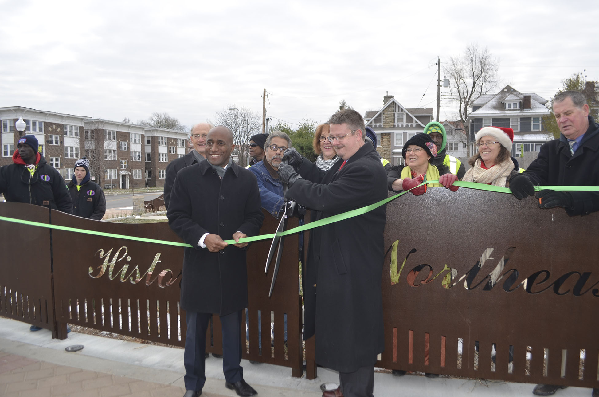 Councilman Scott Wagner (right) cuts the ribbon at the Independence and Benton groundbreaking ceremony in December 2016.