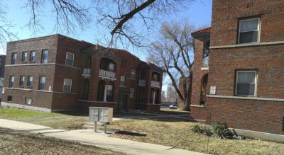 According to the Historic Preservation Department, Nelle Peters did in fact design the apartment complex located due south of Colonial Courts. Those buildings are pictured above.