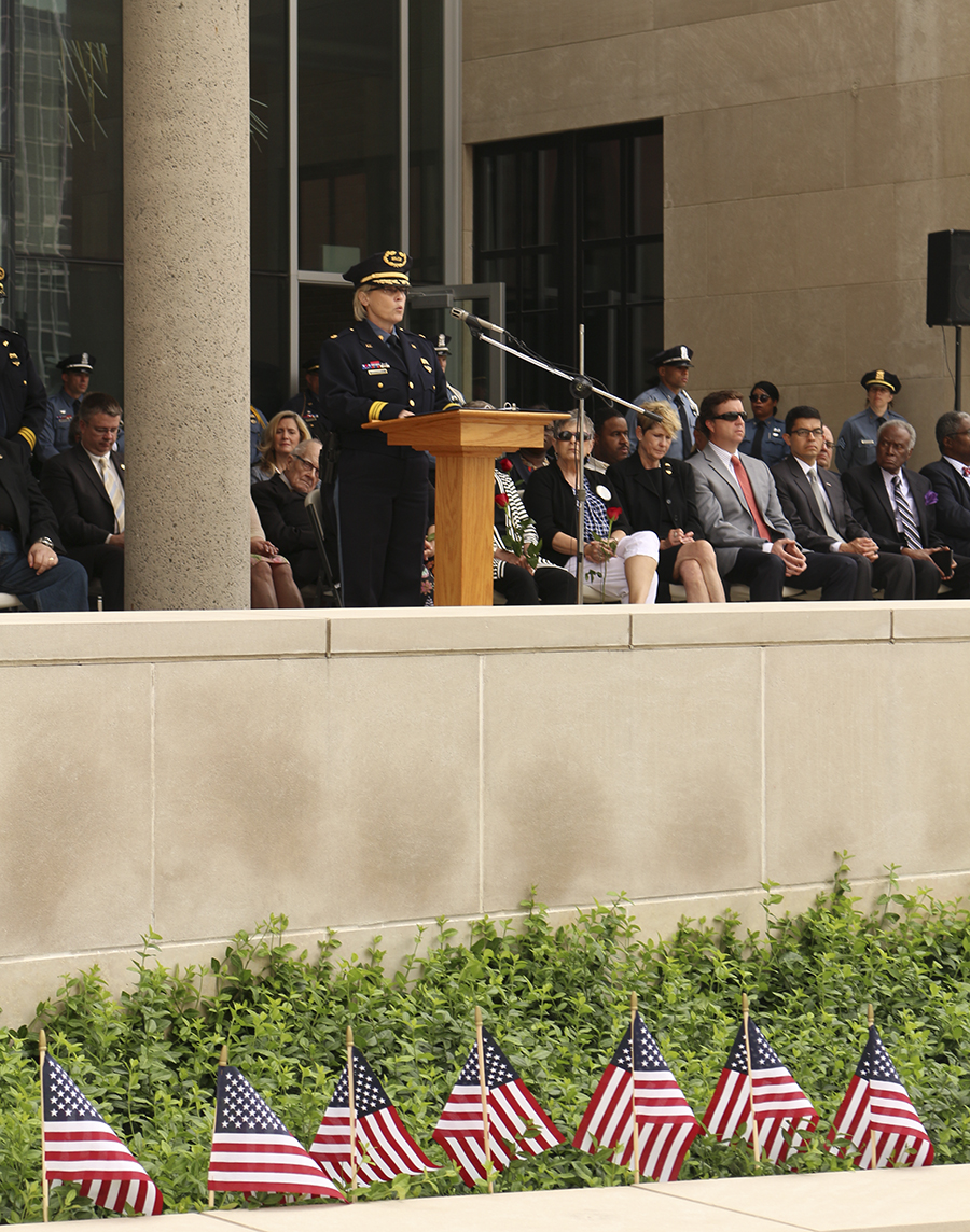 Major Donna Greenwell reads the names of the 119 fallen KCPD officers in the history of the department on May 18, 2017, at the Annual KCPD Memorial Service at the Kansas City Police Headquarters.