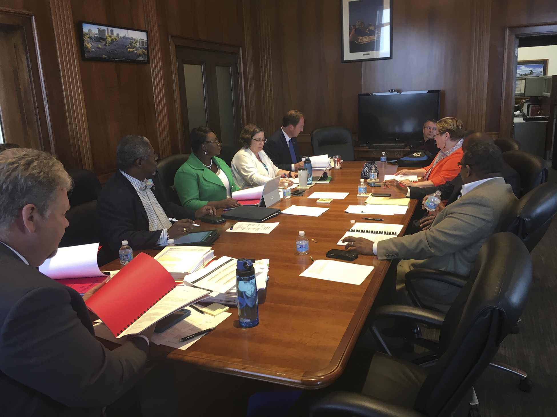 City leaders prepare to go over the updated RFQ/P on Tuesday, June 13.